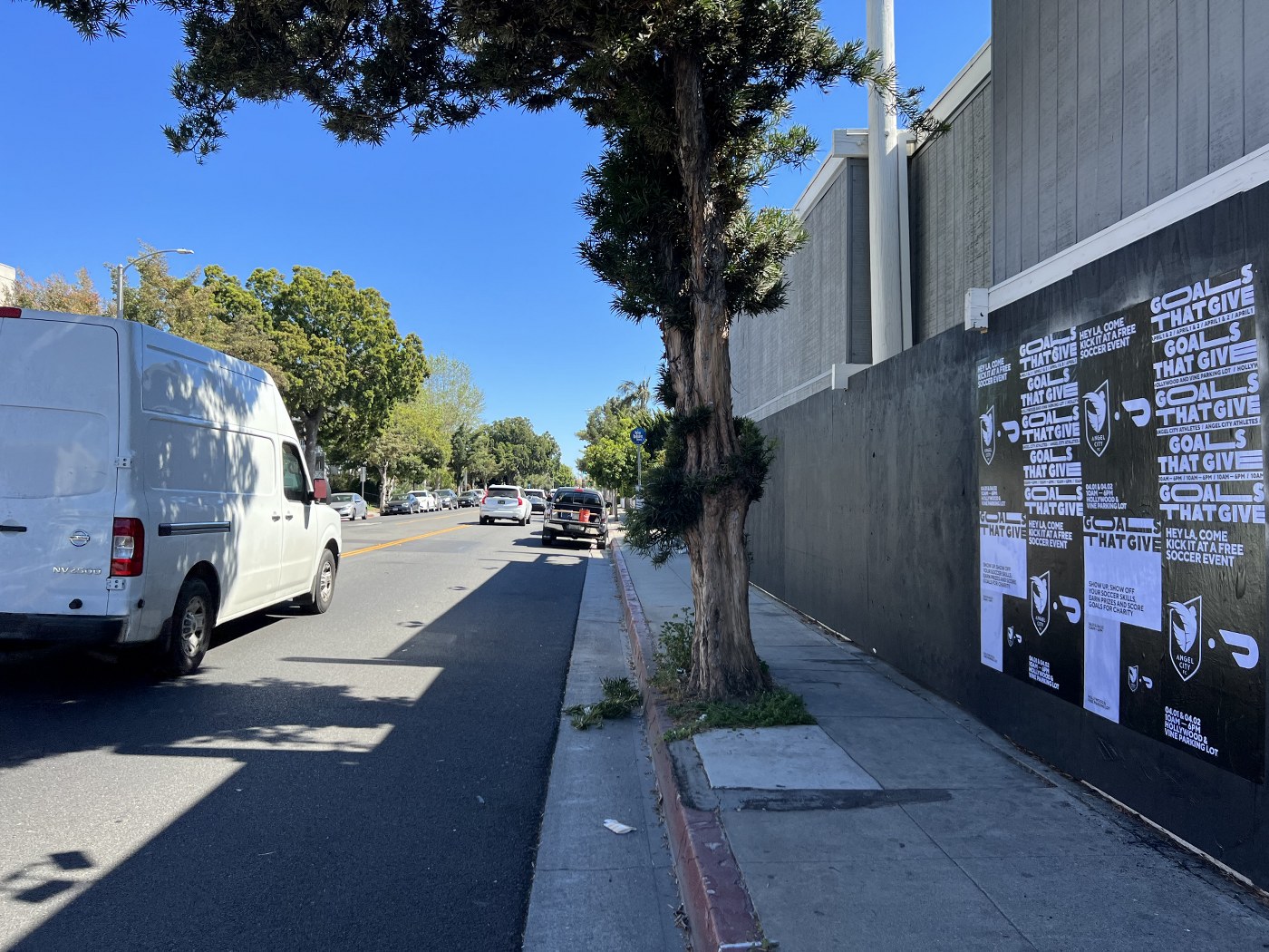 Street poster wheat-paste campaign at 2520 Santa Monica & 26th