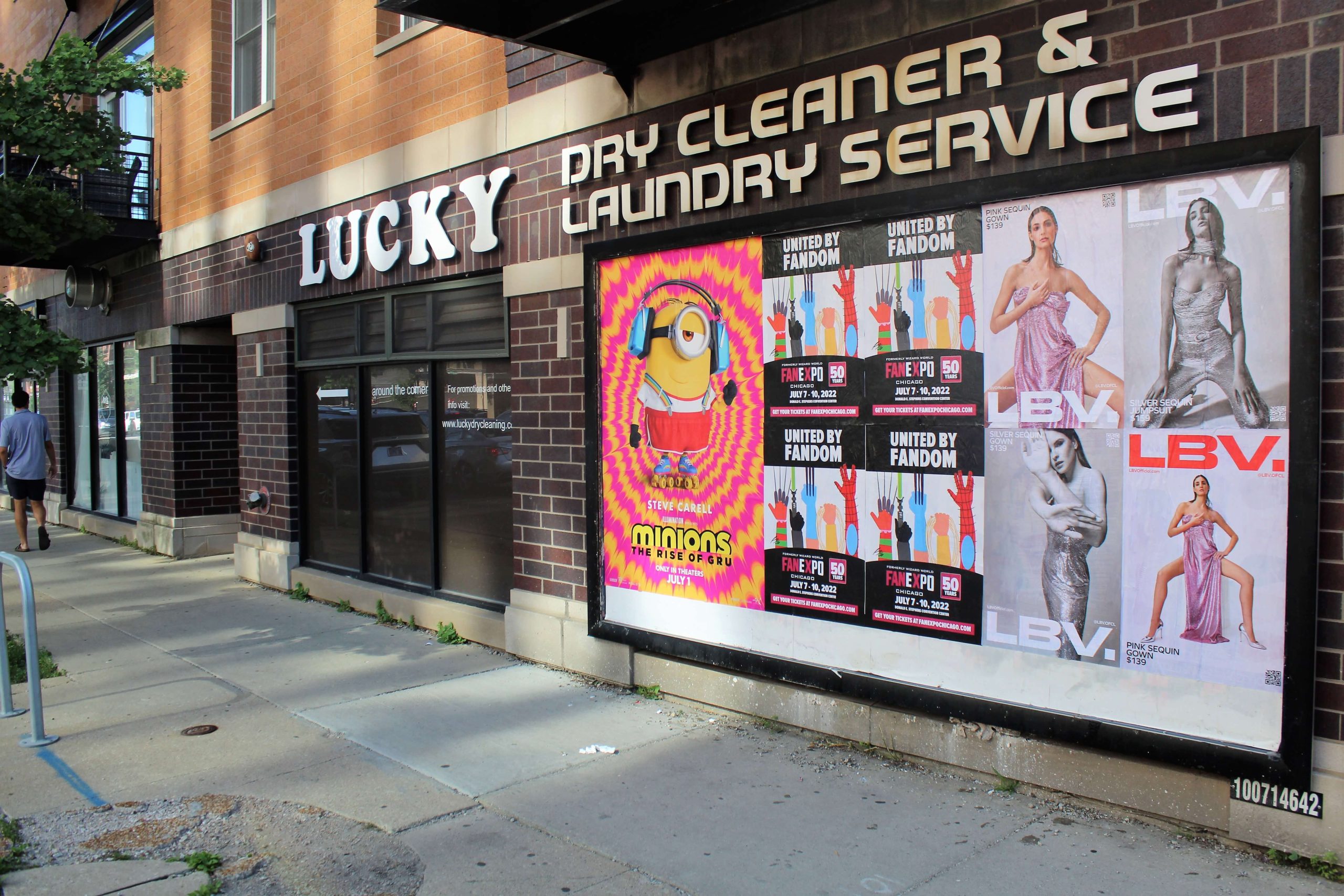 Street poster wheat-paste campaign at 3259 N Asland
