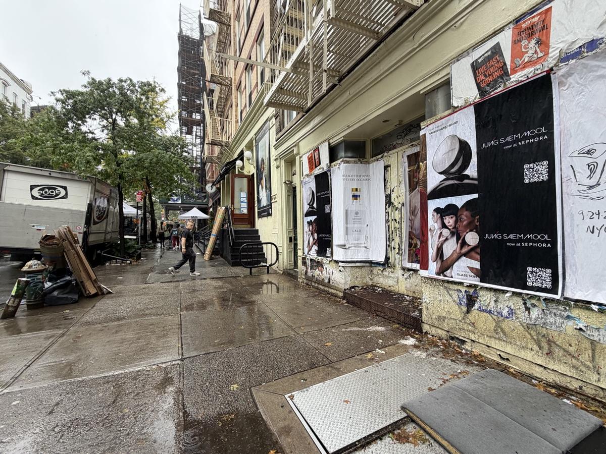 Wheat-paste posters at 51 E Houston St & Mott